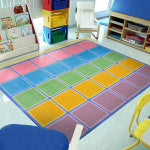 Joy Carpets Kid Essentials Rectangular Area Rug, Blocks Abound, 7-2/3ft x 10-3/4ft, Pastel